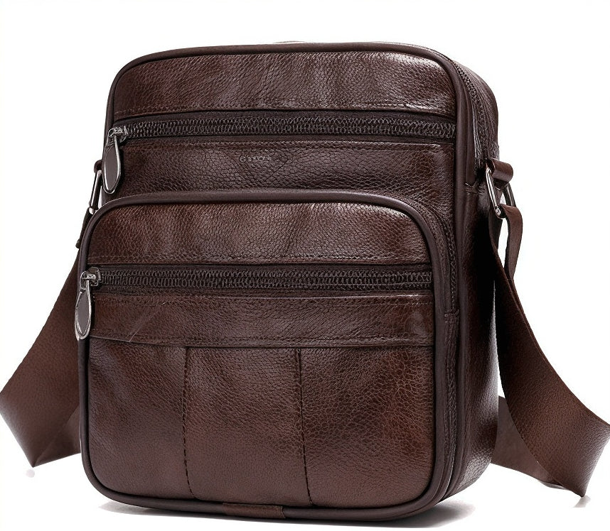 Brown leather crossbody bag on a white background