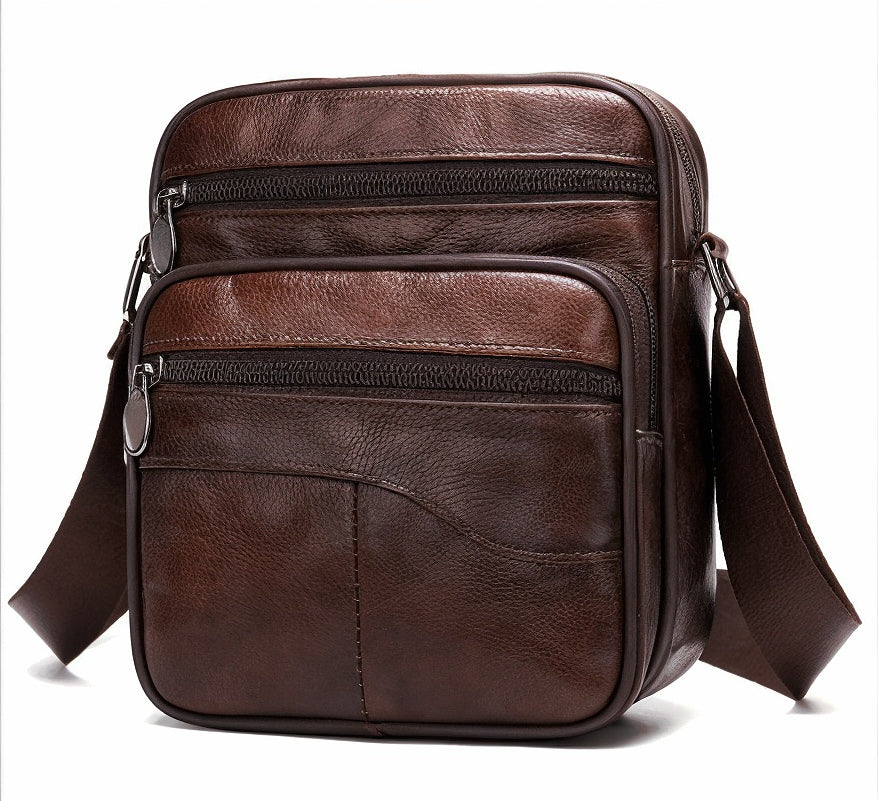 Brown leather crossbody bag on a white background