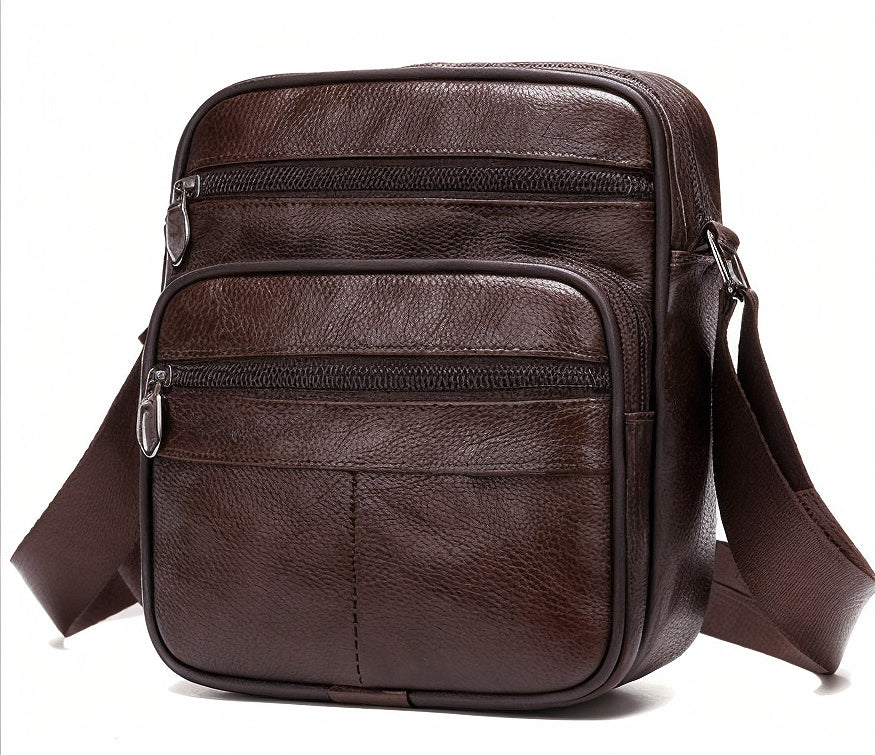 Brown leather crossbody bag on a white background