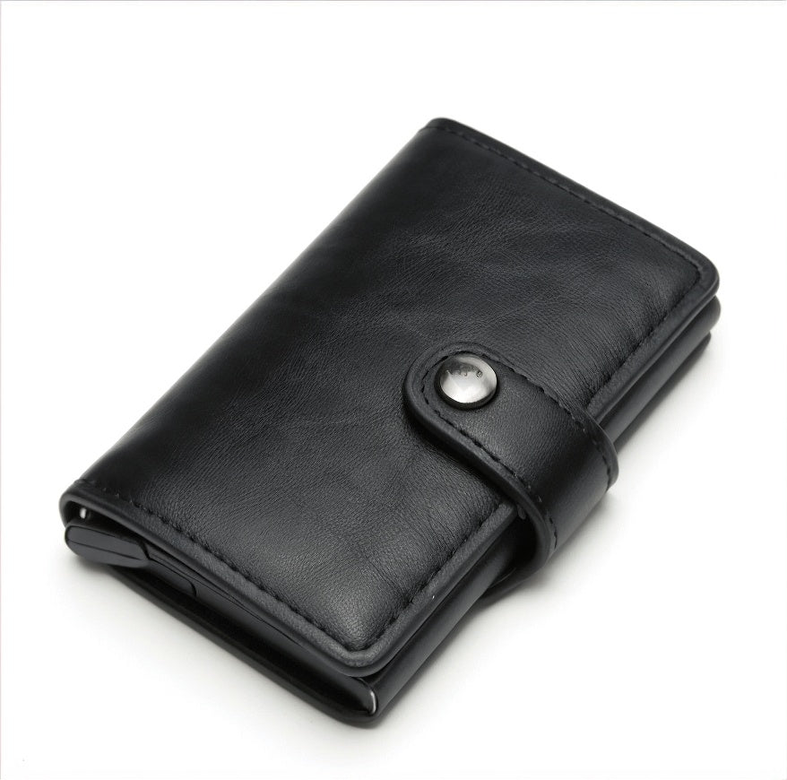 Black leather wallet with a silver button on a white background