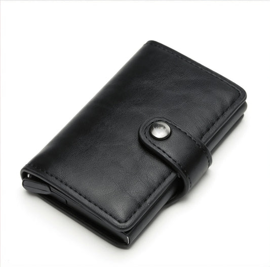 Black leather wallet with a silver button on a white background